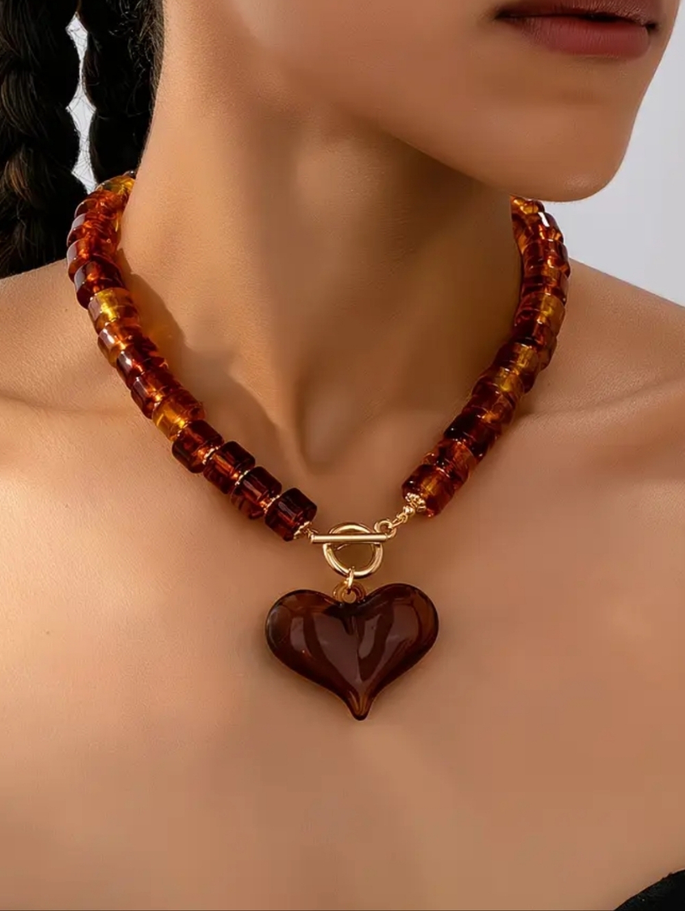 Amber colored acrylic necklace; 15.7" without the heart; nwot
